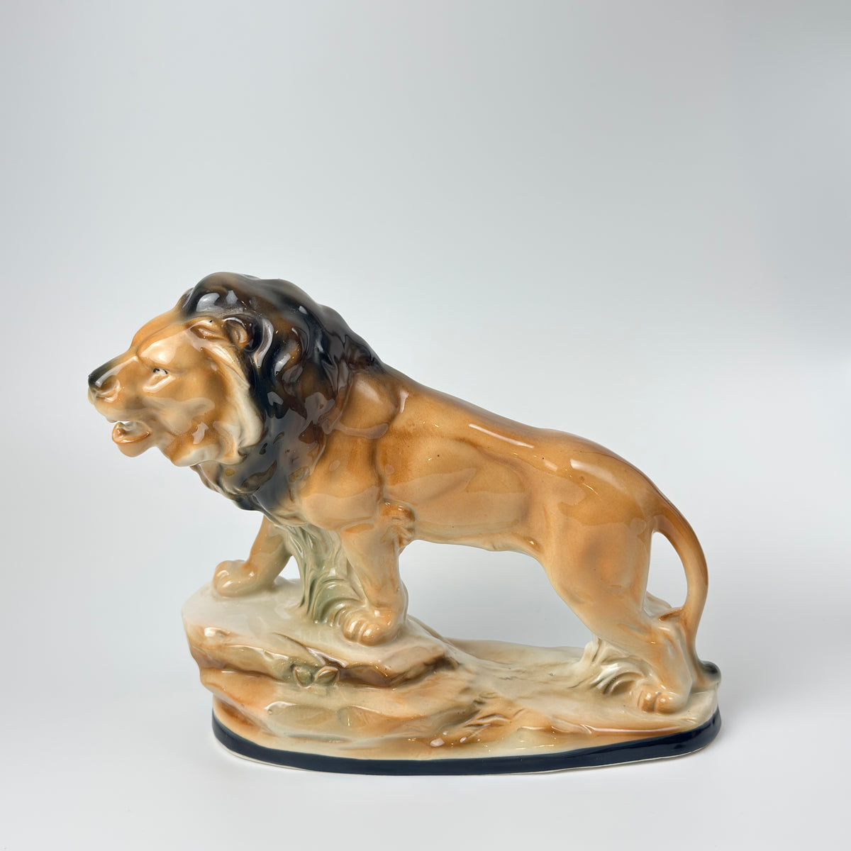 Løve i porcelænsfigur, mrk. nr. 9299, vintage fra 1930-1940'erne