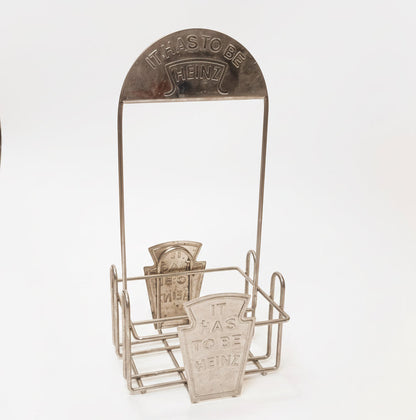 Vintage Heinz flaskeholder / condiment caddy i metal – “It Has To Be Heinz”