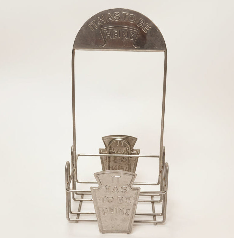 Vintage Heinz flaskeholder / condiment caddy i metal – “It Has To Be Heinz”