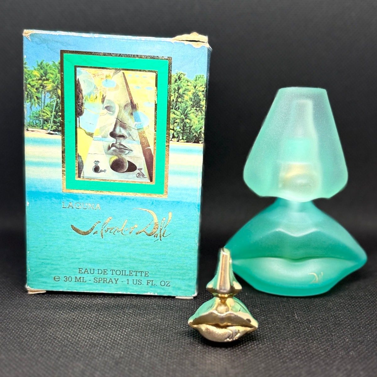 Salvador Dalí messingvedhæng + Laguna Eau de Toilette 1998 - Frøken Lilly